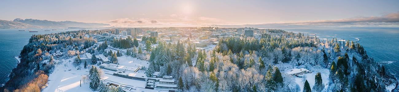 Aerial view of the UBC Vancouver Campus in winter time with snow