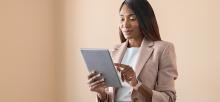 Business woman using tablet